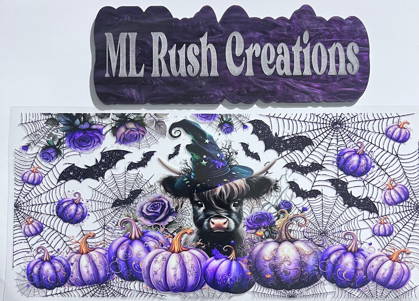 HYLAND COW WITH PURPLE PUMPKINS WITH BATS